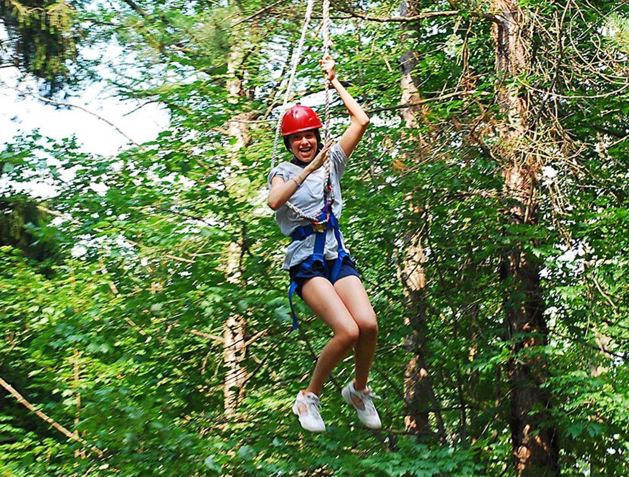 girl on ropes course